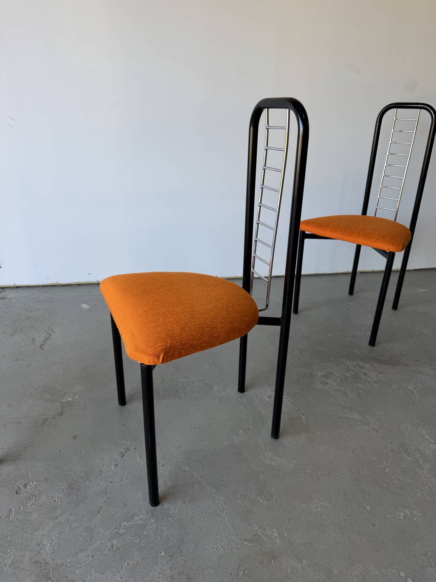 Set of 4 Italian design chairs in vintage black metal and chrome.