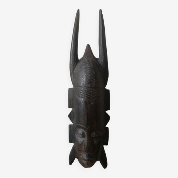 Carved wooden mask, vintage tribal decoration object, African art