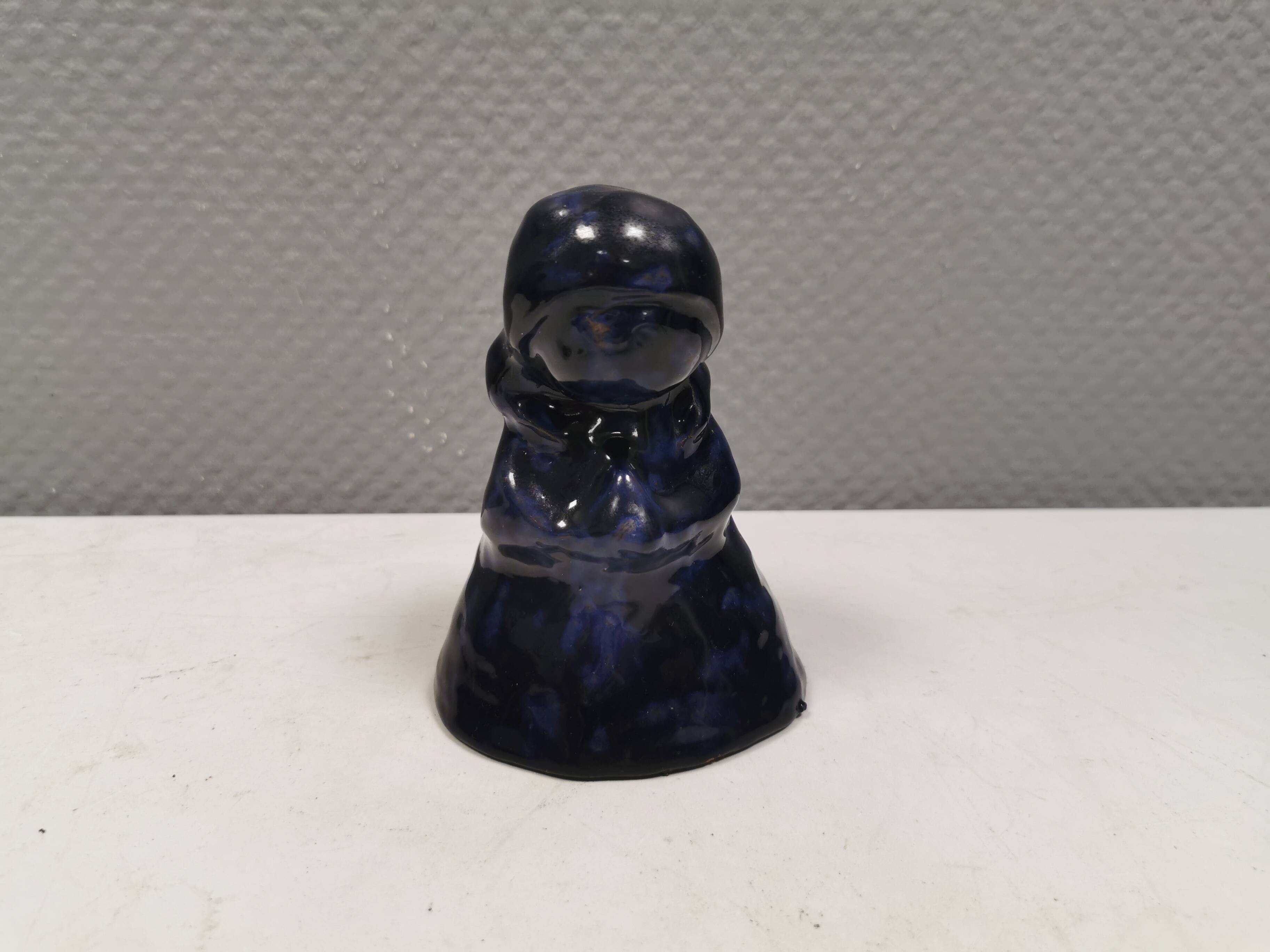 Lady figure in earthenware with shiny blue glaze