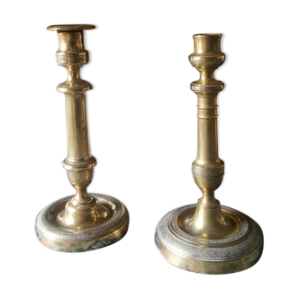 Set of 2 old candle holders in golden brass