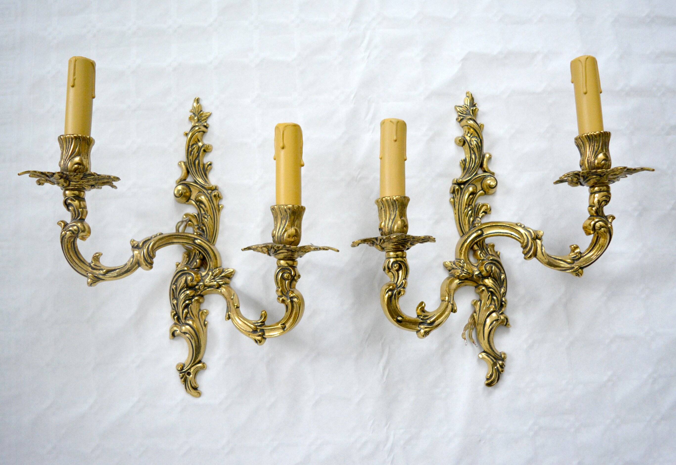 2 brass wall lights with toile de jouy lampshades