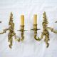 2 brass wall lights with toile de jouy lampshades