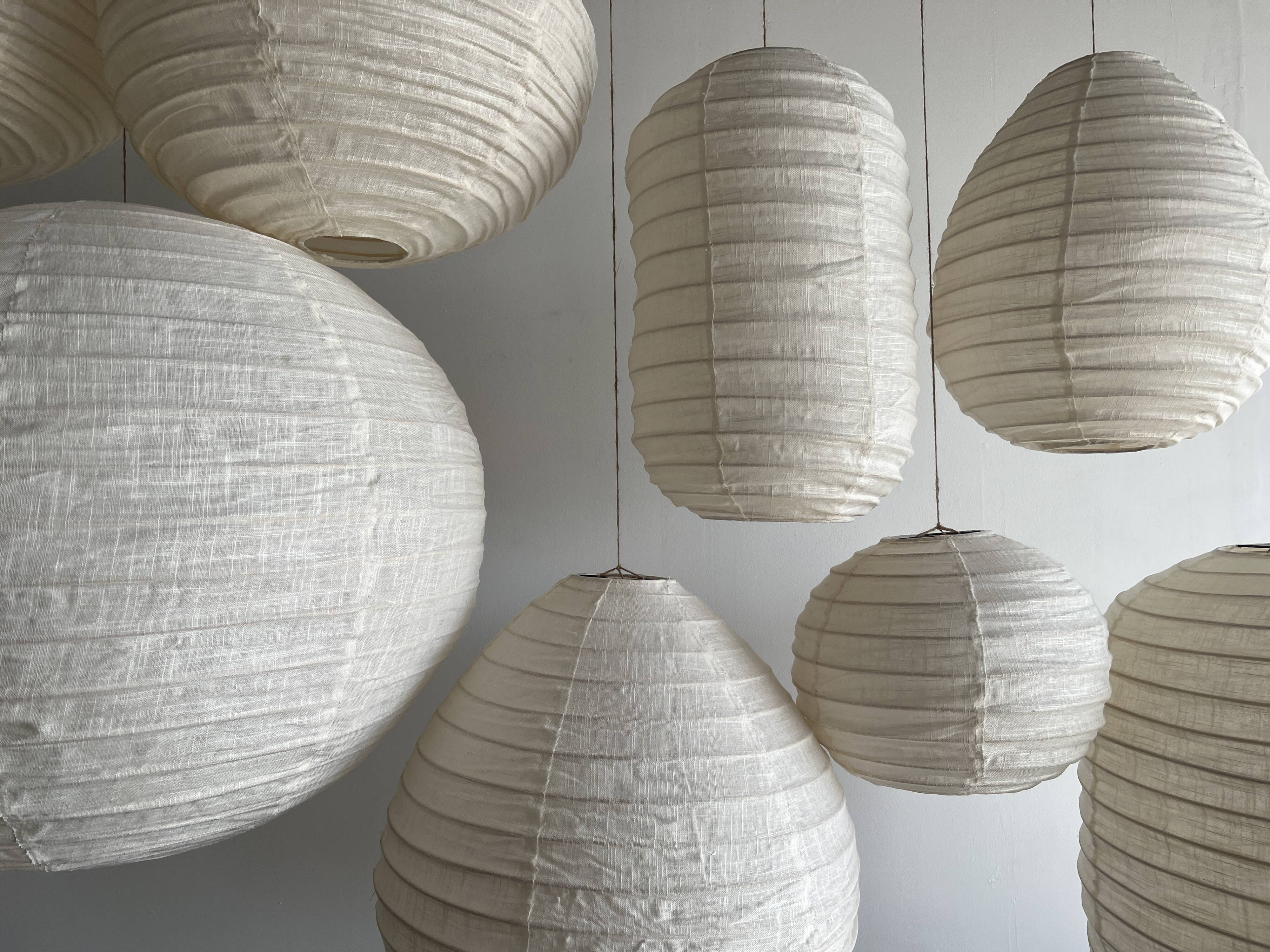Suspension in rattan and natural japanese linen in the shape of a drop