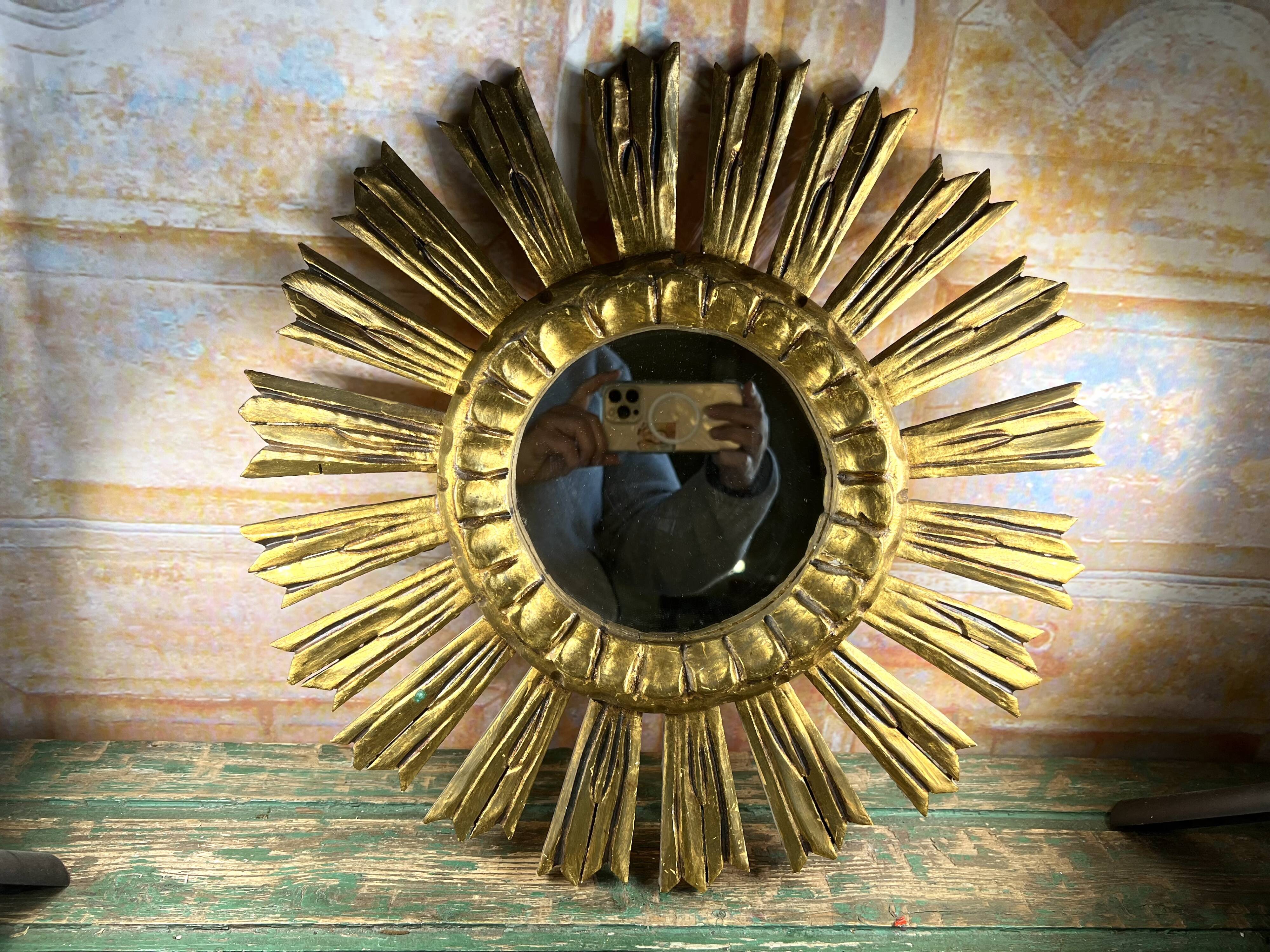 Sunburst mirror in gilded wood