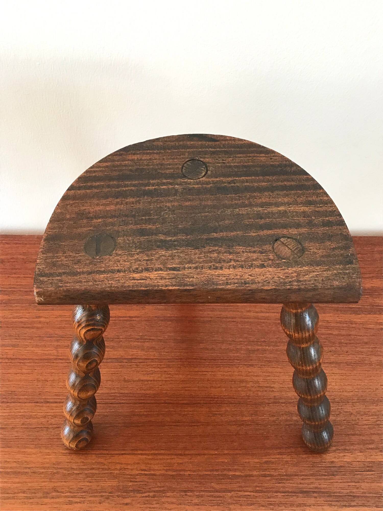 Vintage solid wood tripod stool from the 70s