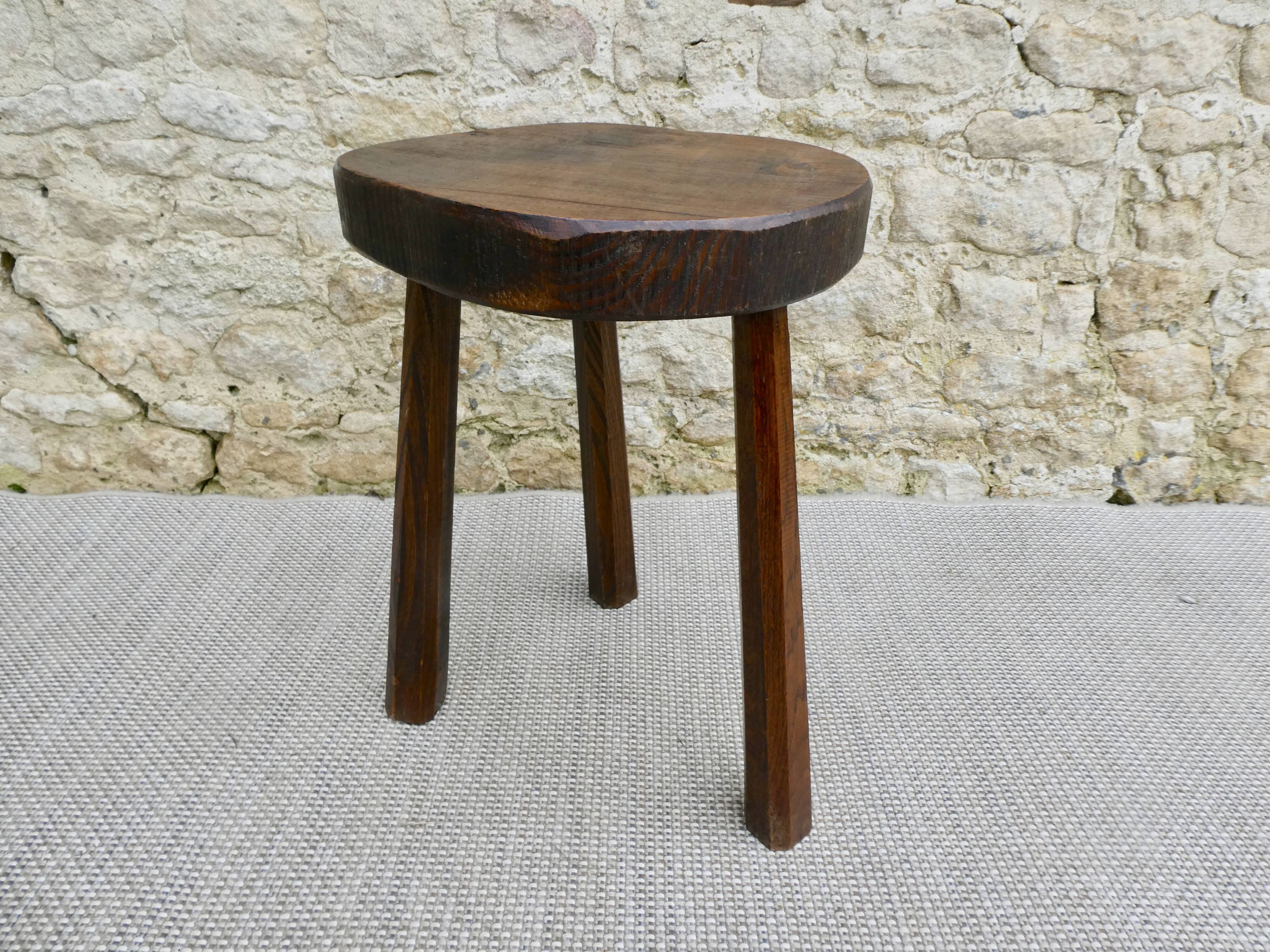 Tripod stool in raw wood