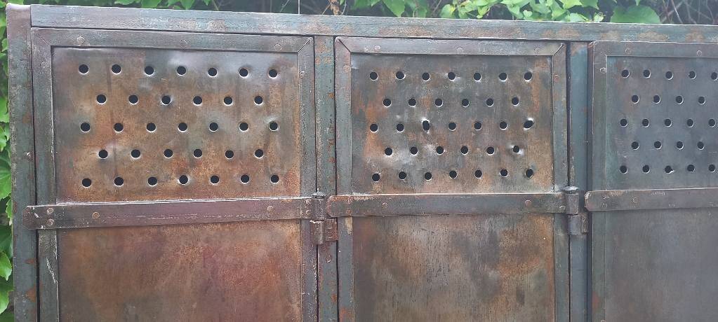 Very old riveted 5-door locker room