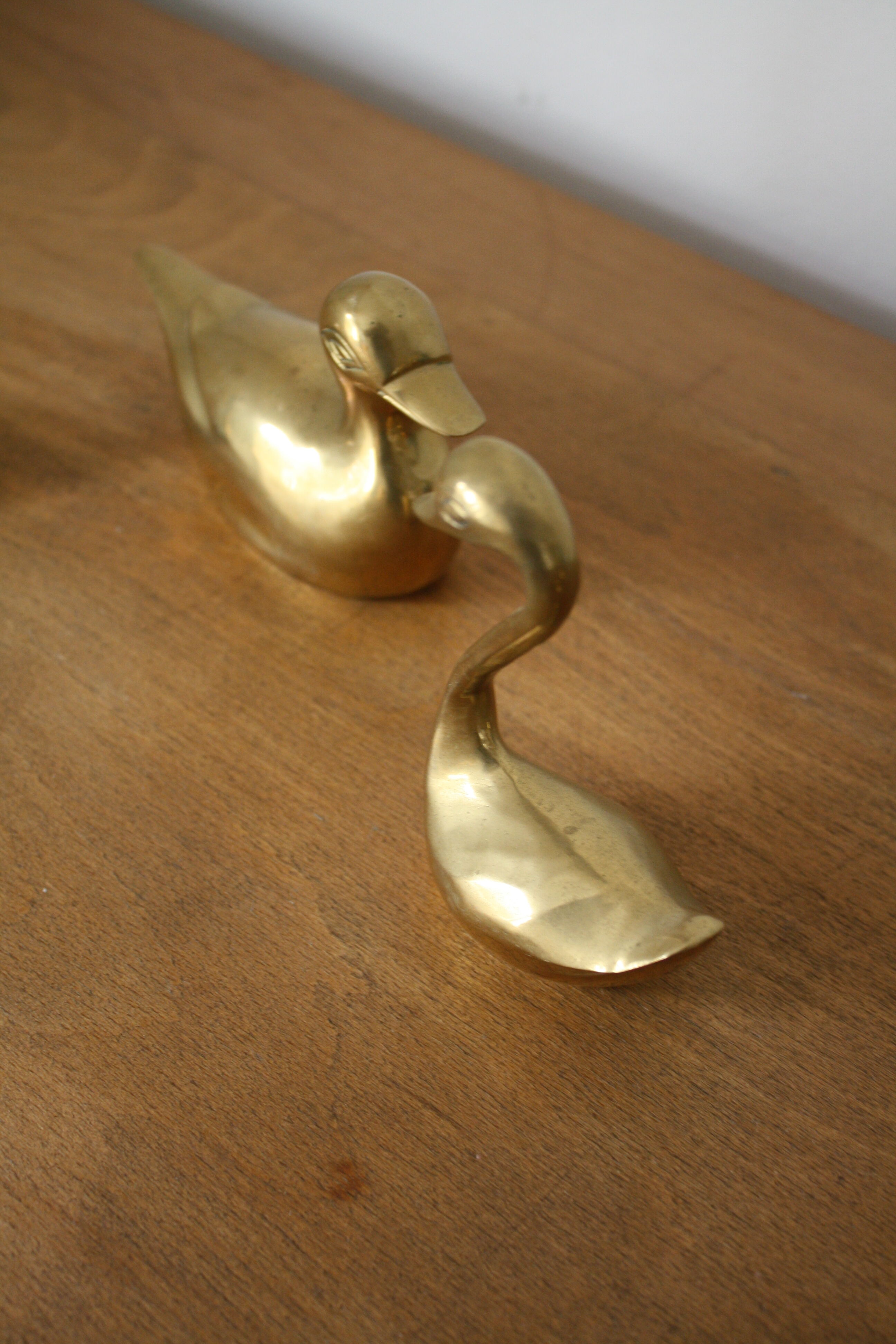 Set of 2 ducks and 1 brass swan