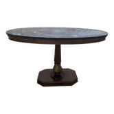 Oval Empire-style gueridon in walnut and marble.