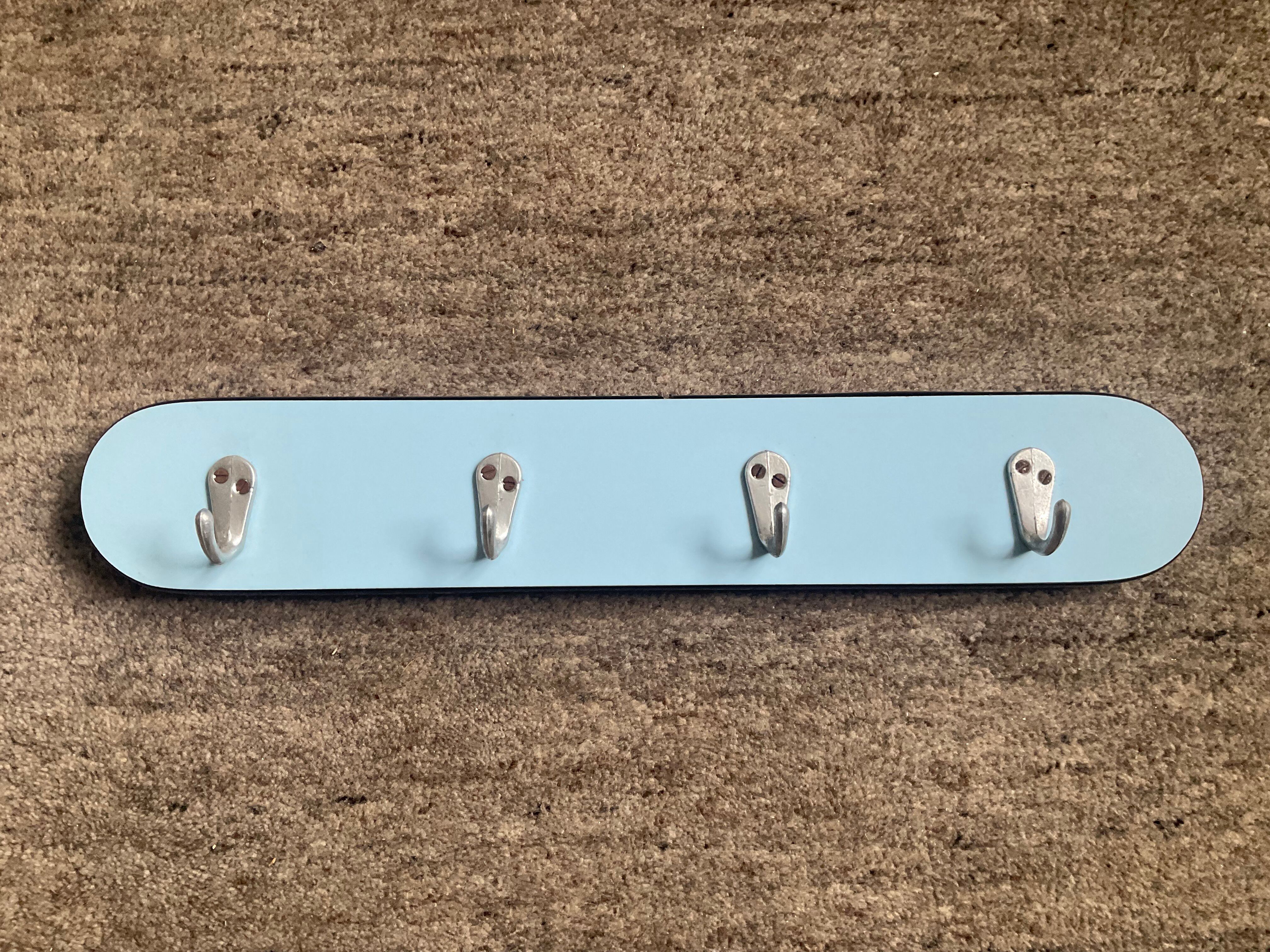 1960s towel rack in blue Formica