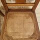 Lot de 4 anciennes chaises cannées en bois art déco