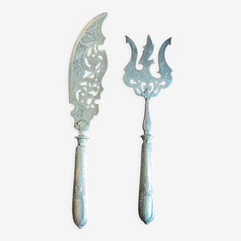 Old silver metal fish cutlery