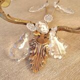 Gold wall light with tassel