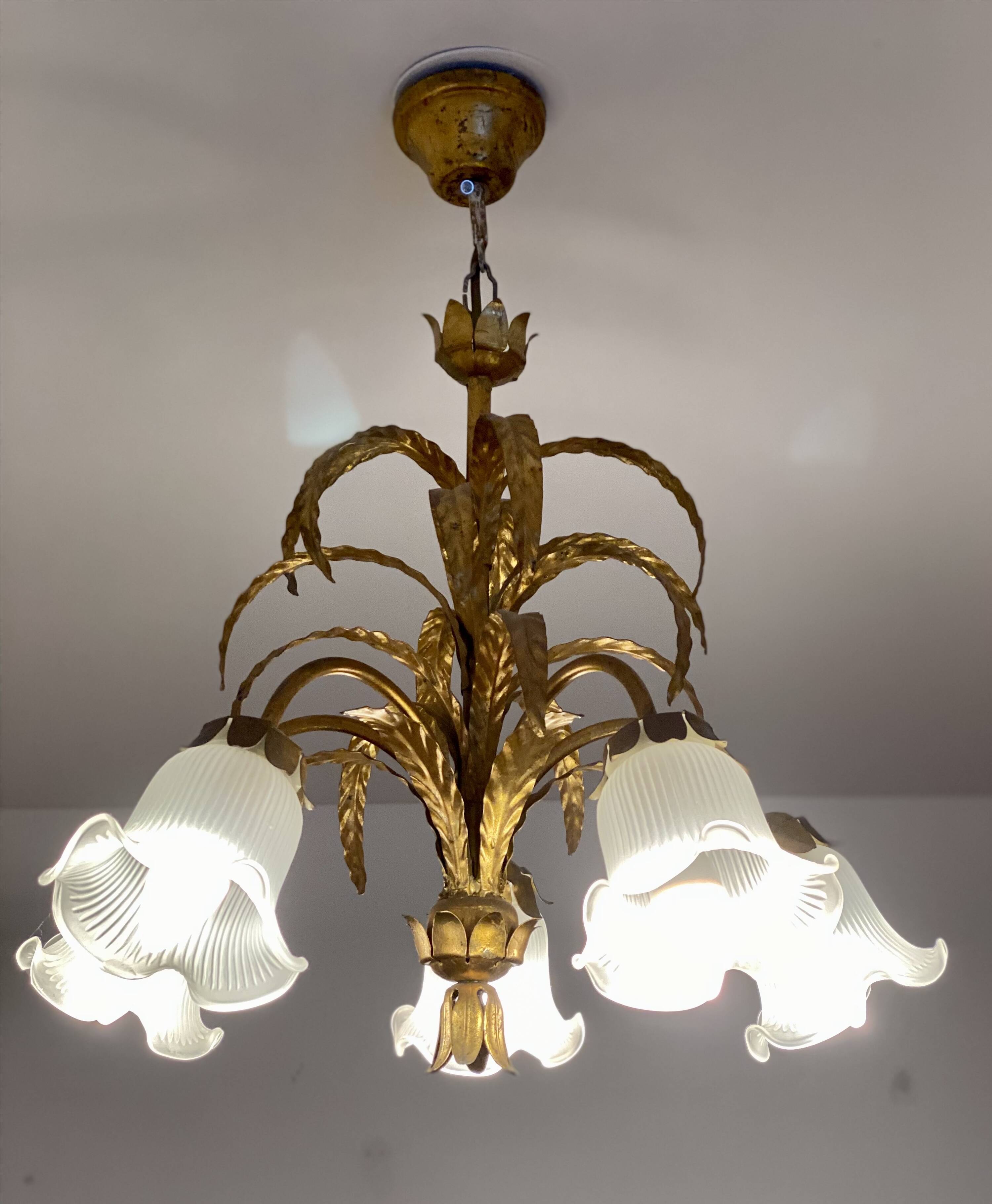 Vintage 1970s golden metal palm chandelier in the style of JANSEN.