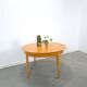 Table à manger ronde extensible Lübke design