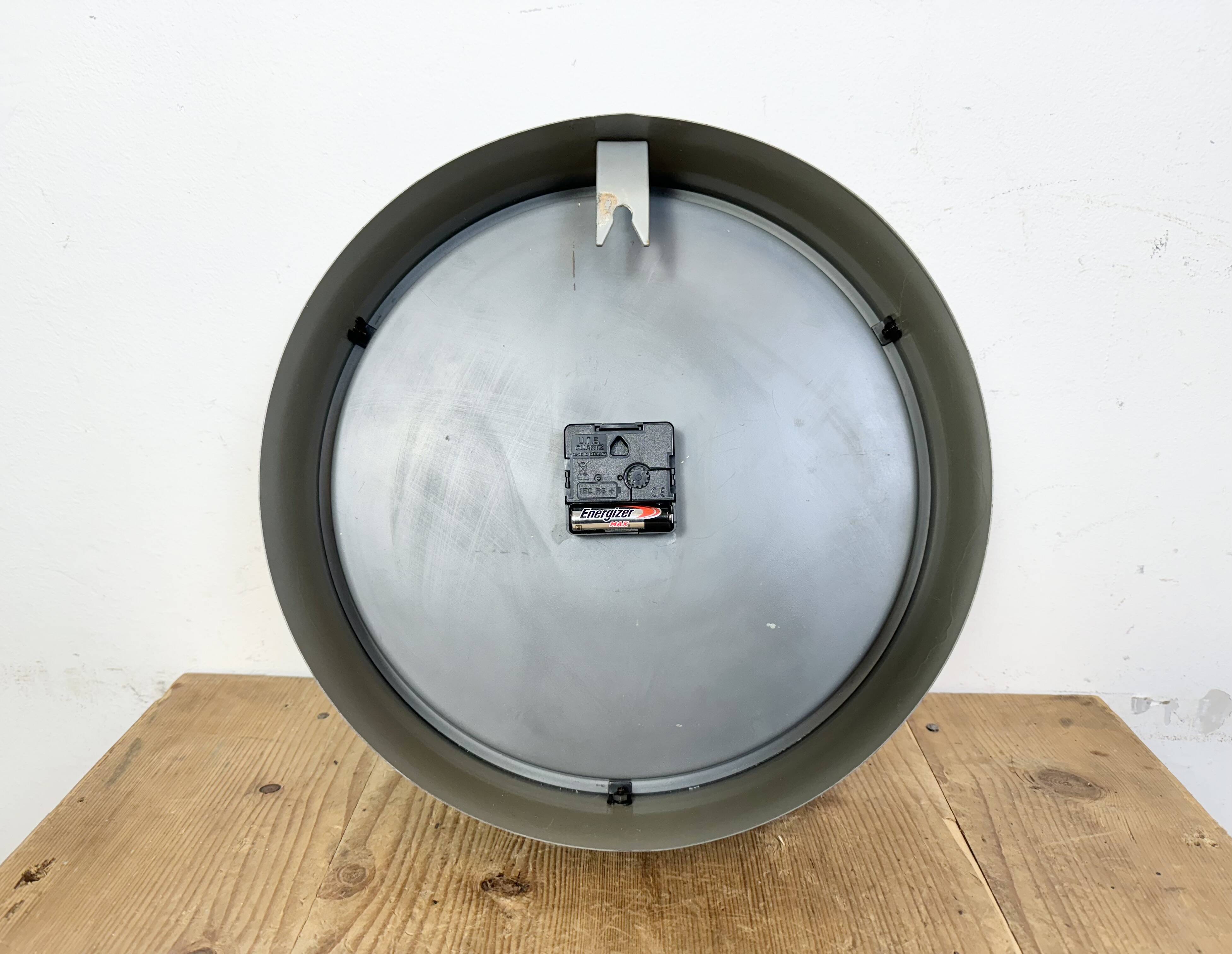 Industrial grey factory wall clock from pragotron, 1960s