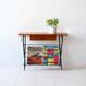 1960s bedside table with metal legs