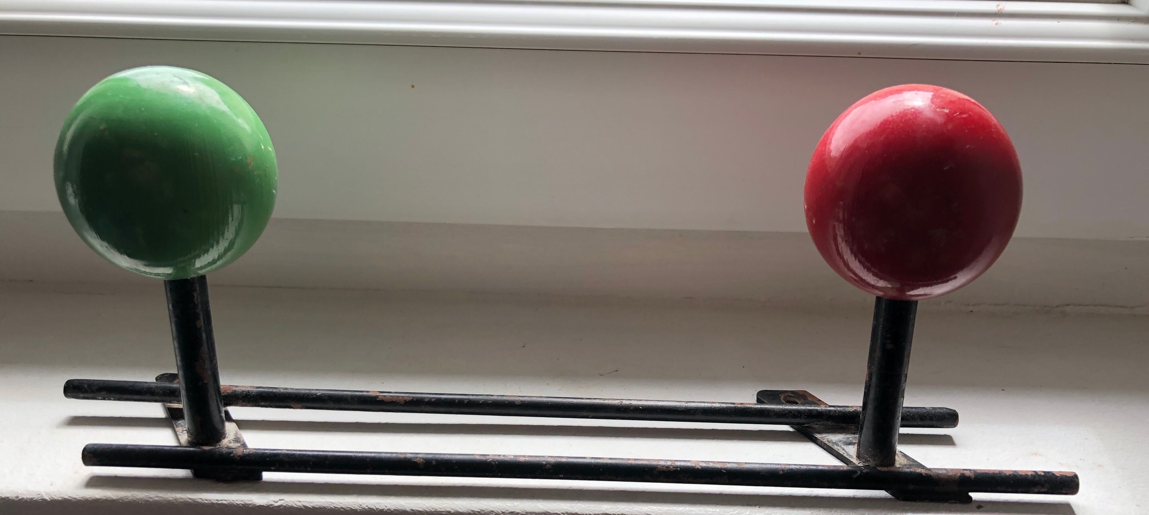 Patère two vintage balls wears old coat