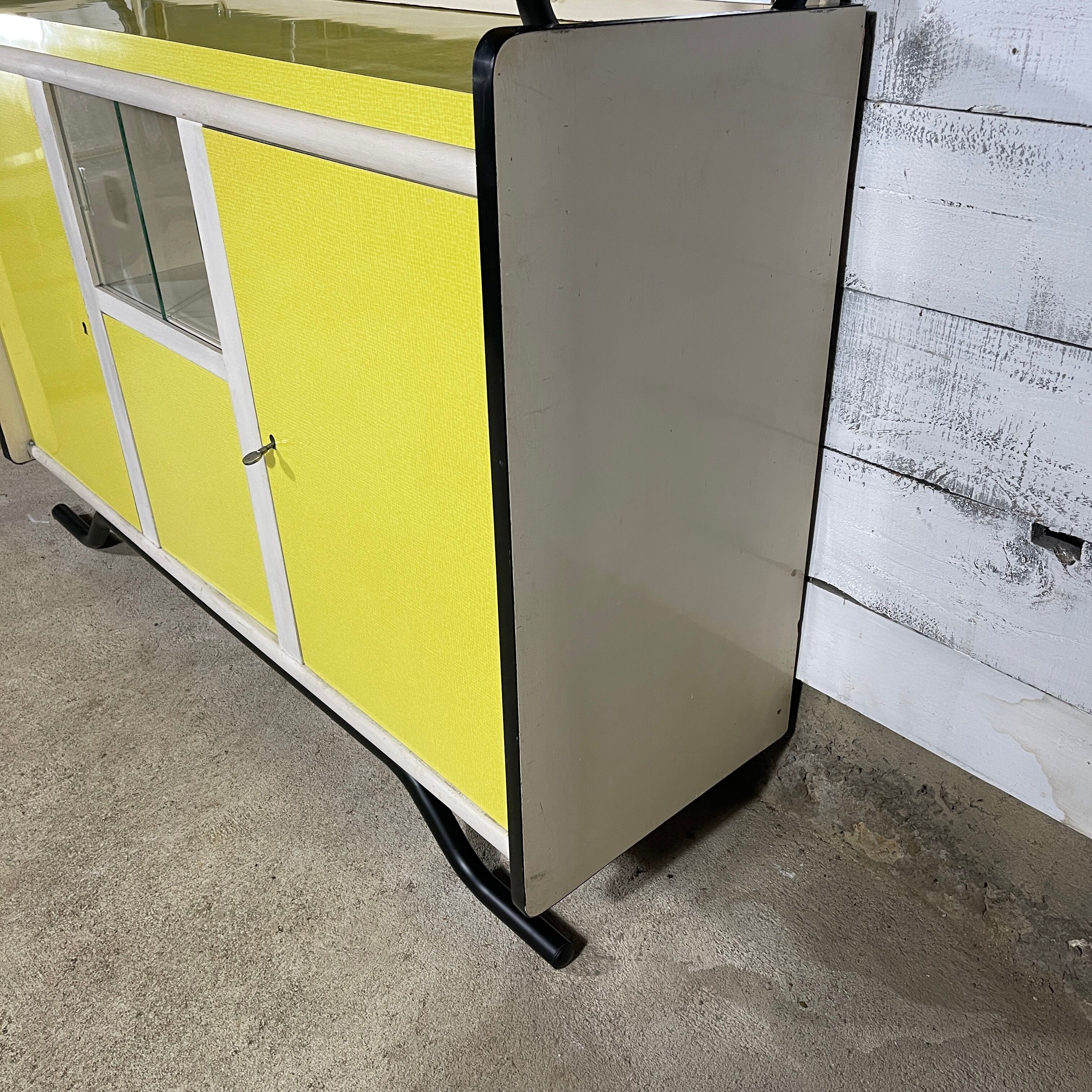 Yellow vintage kitchen furniture in Formica