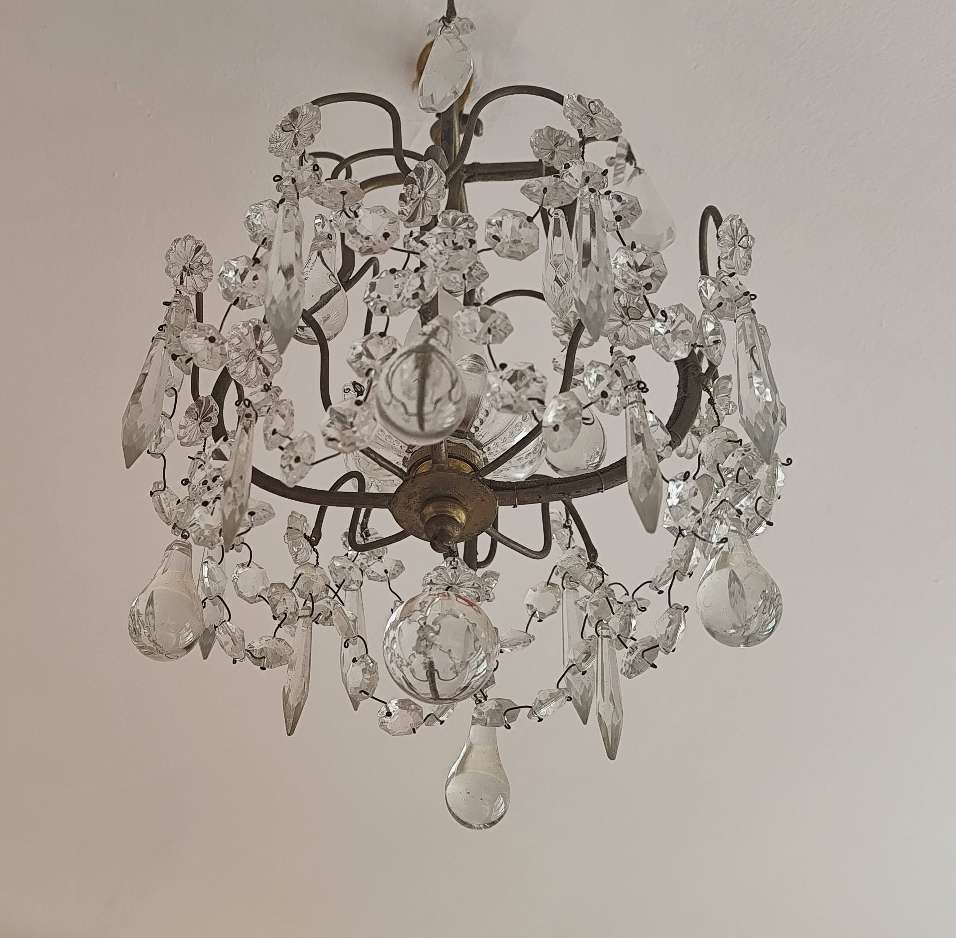 brass cage chandelier with crystal tassels