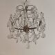 brass cage chandelier with crystal tassels