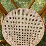 Set of four cane and webbing bar stools