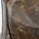 Very comfortable vintage cow leather armchair with character