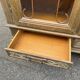 Spanish Renaissance display case in patinated solid wood