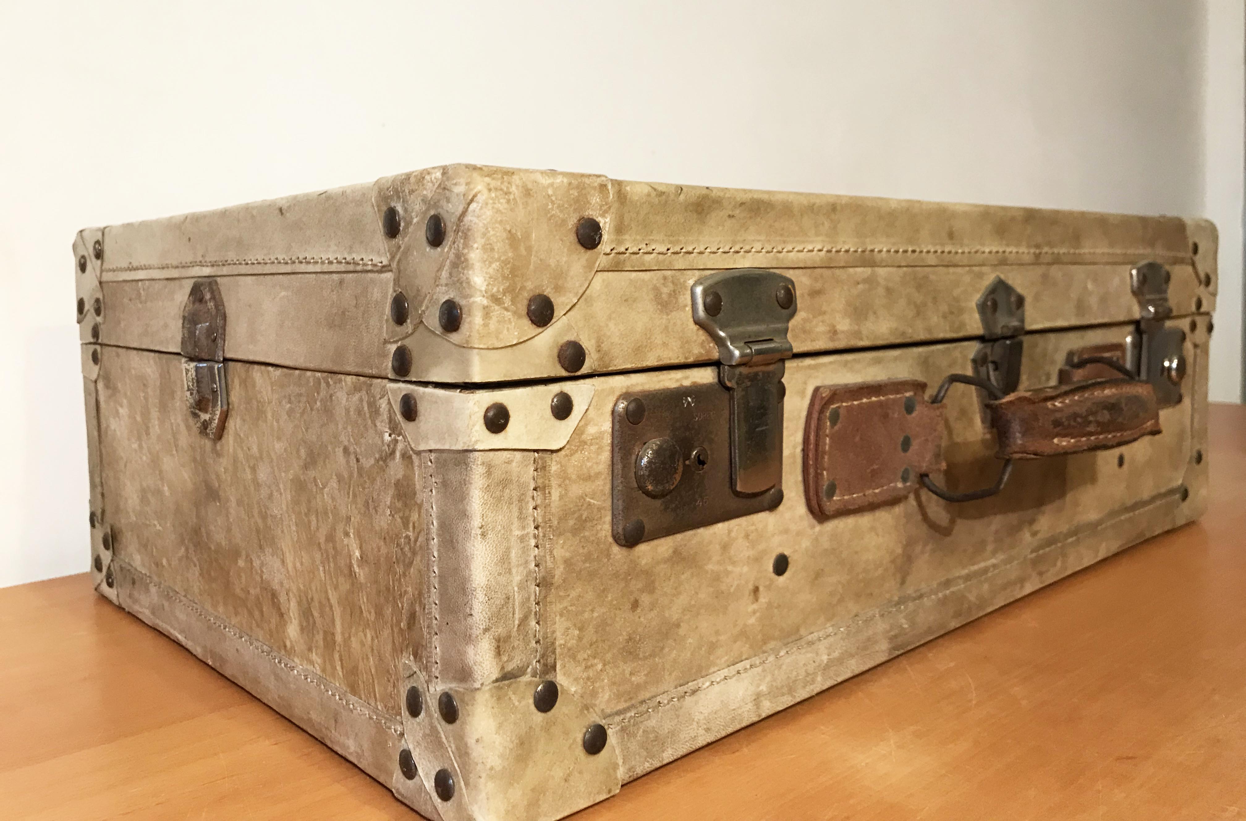 Vintage parchment beige and leather suitcase