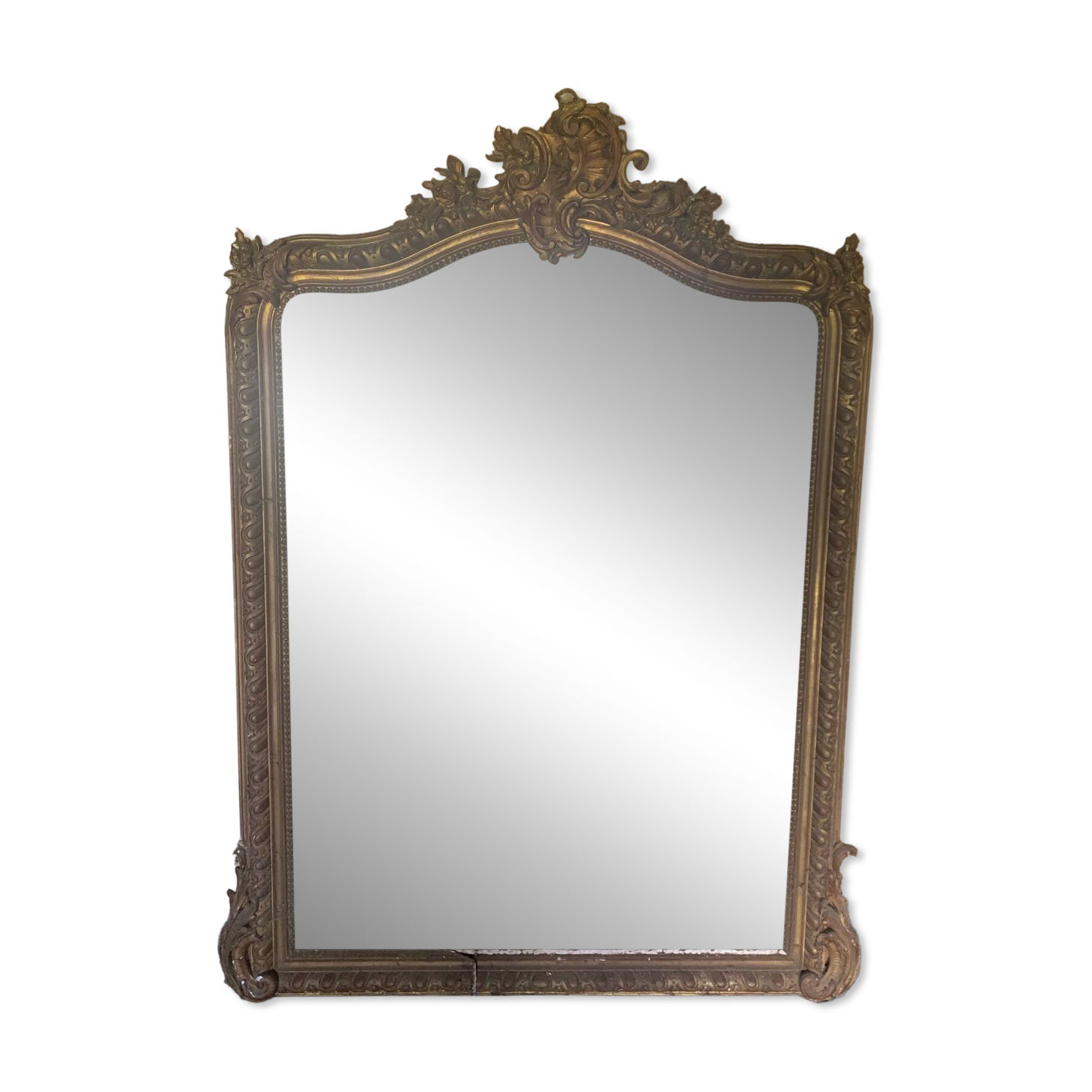 Large antique mirror in wood and gilded stucco.