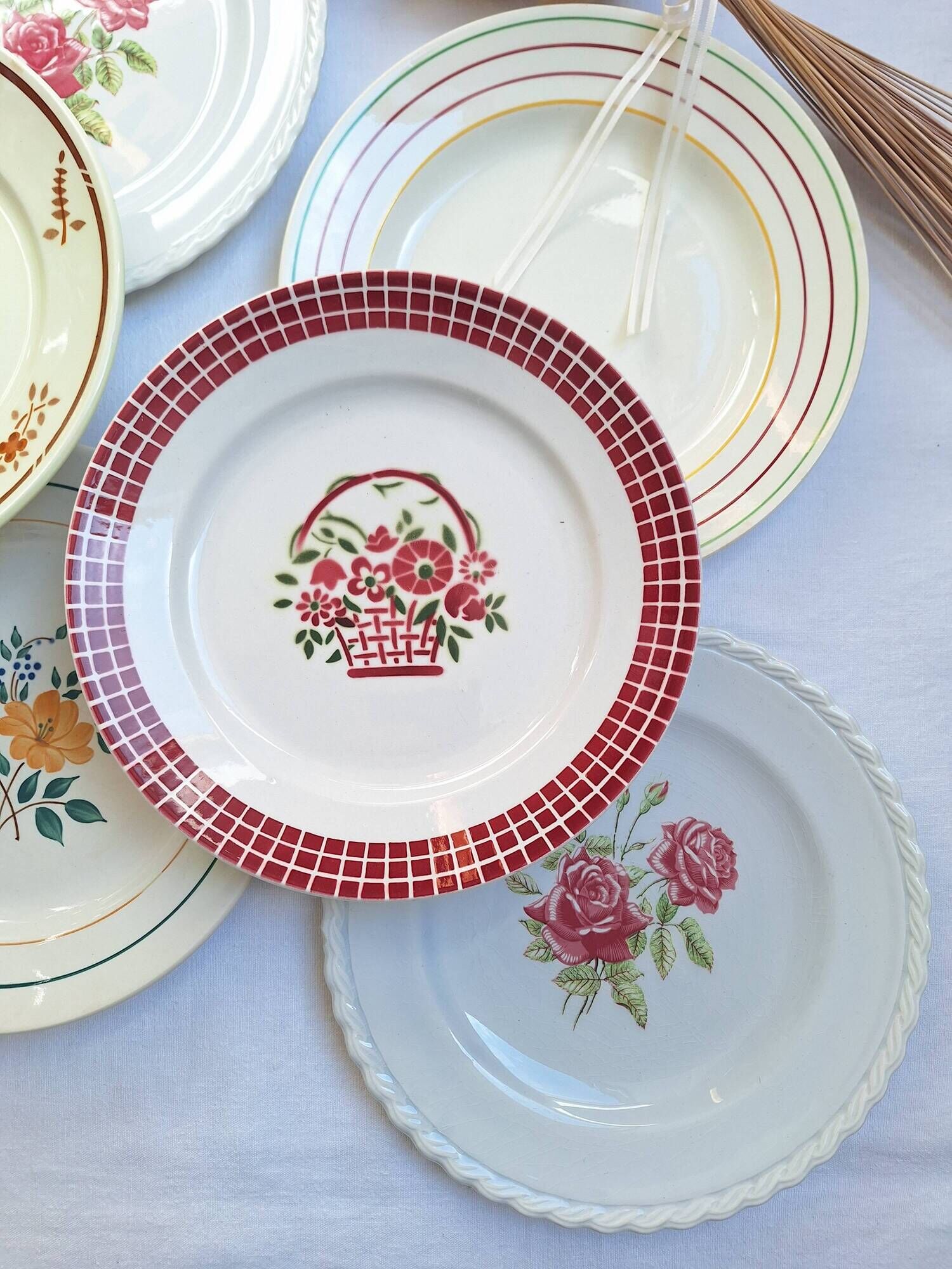 Multicolored flower dinner plates from Moulin des Loups, St Amand and Badonville