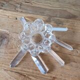 Old candlestick with molded glass stamps