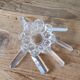 Old candlestick with molded glass stamps