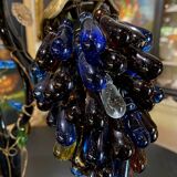 Table lamp with four light arms, grape cluster-shaped globes