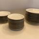 Service of 34 Limoges porcelain plates by Chastagner & Cie – Gilded borders.