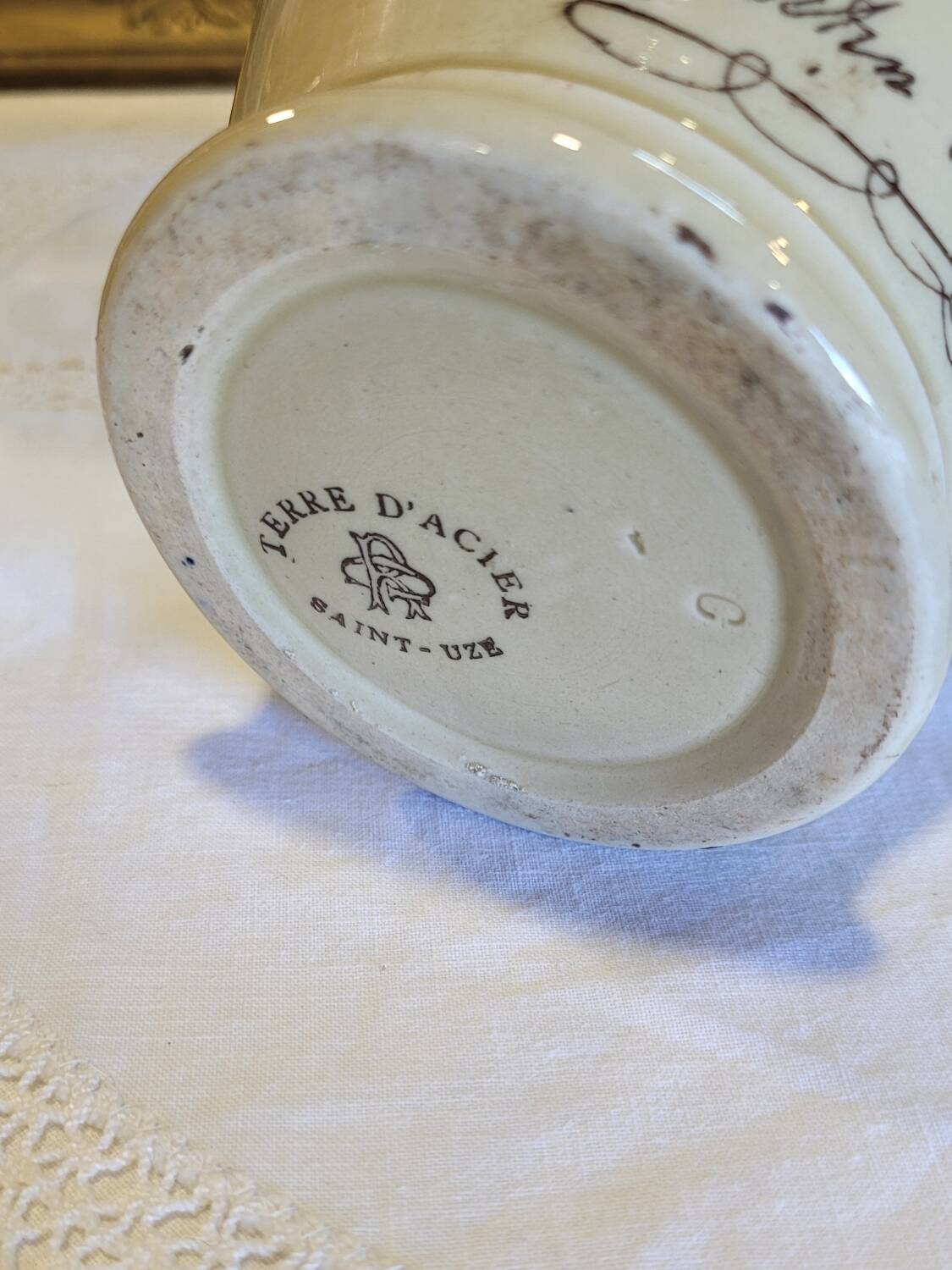 Antique iron-rich earth bottle from Saint Uze, ceramic carafe jug.