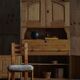 Old Danish secretary in pine with drop-down front and upper cabinet, mid-19th century.