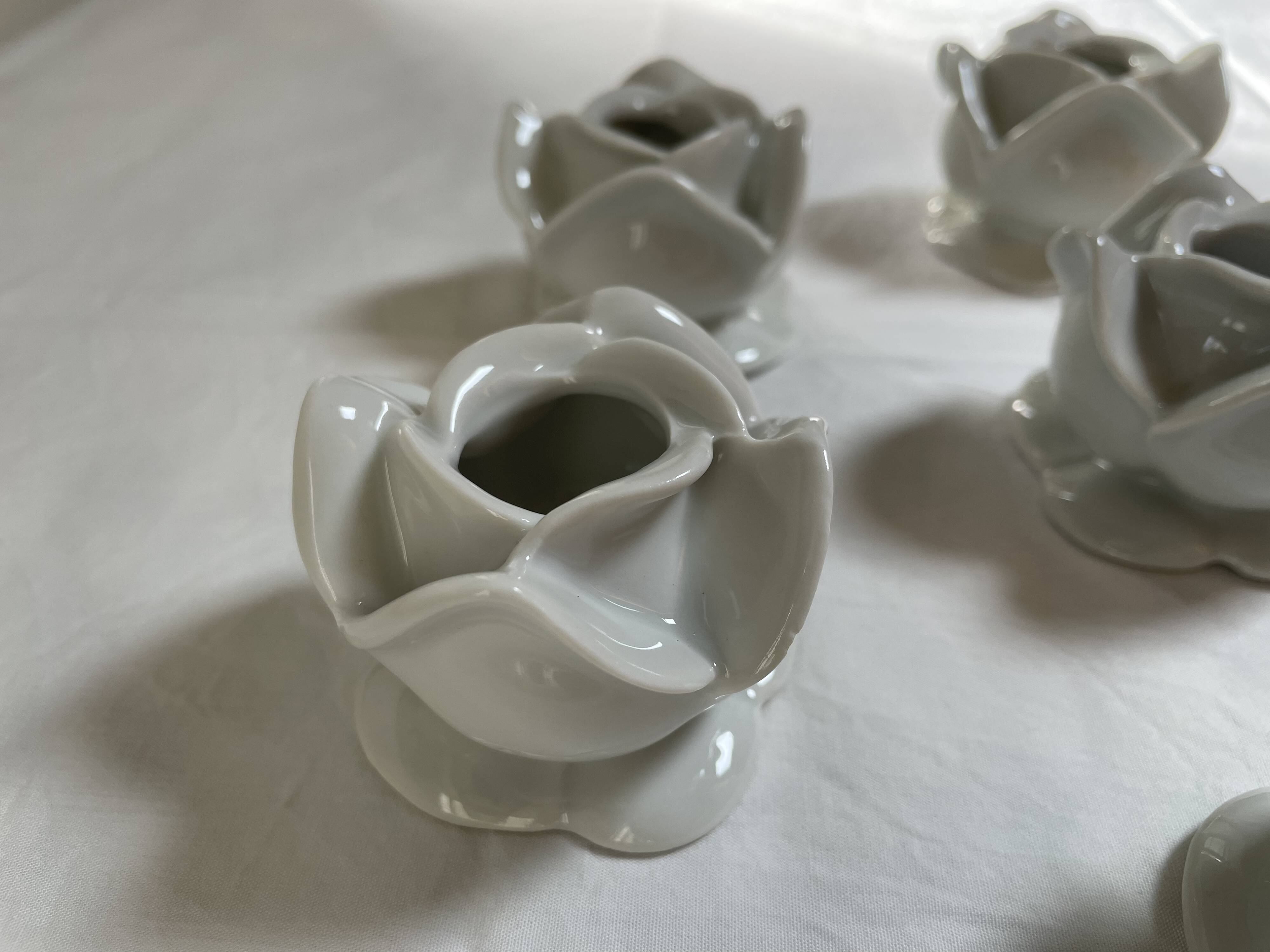 White porcelain rose shaped candle holders