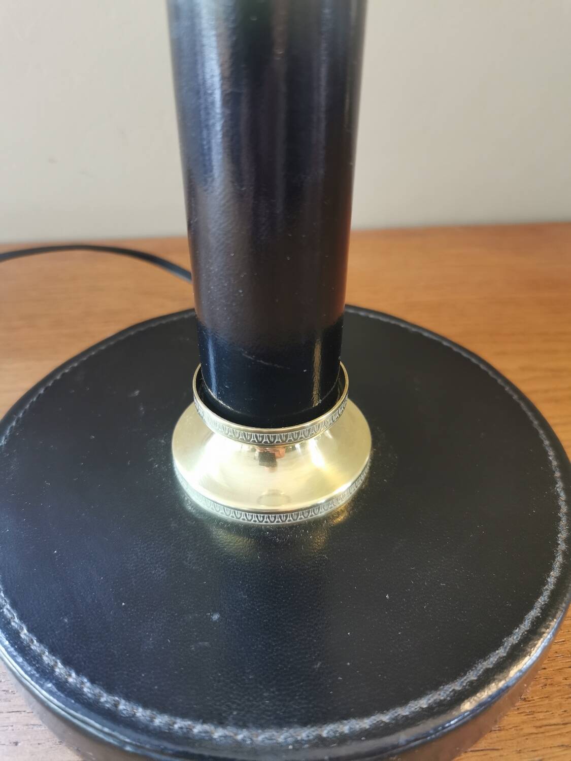 Vintage lamp base in black leather and brass