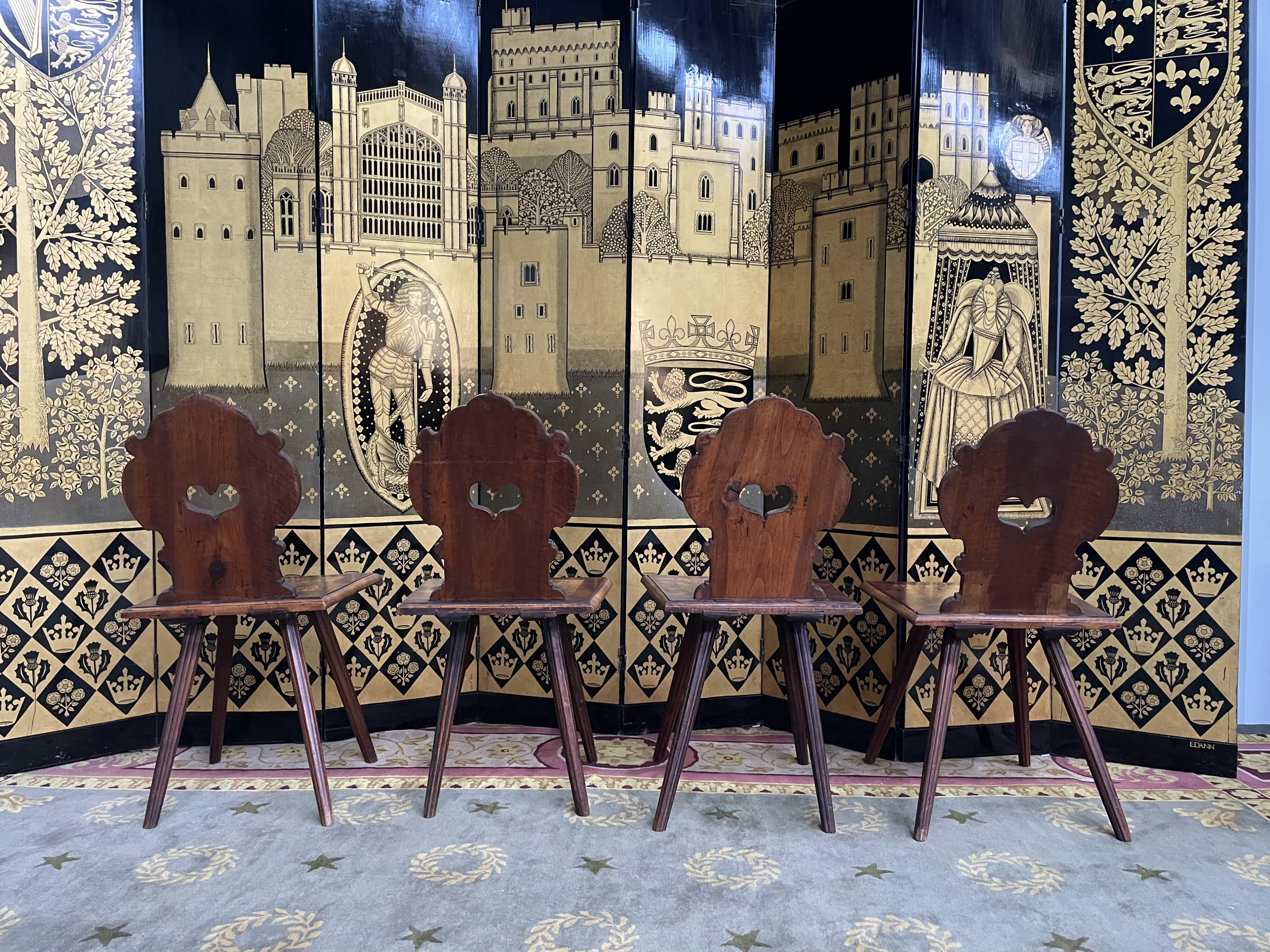 Suite of 4 Alsatian chairs in elm magnifying glass