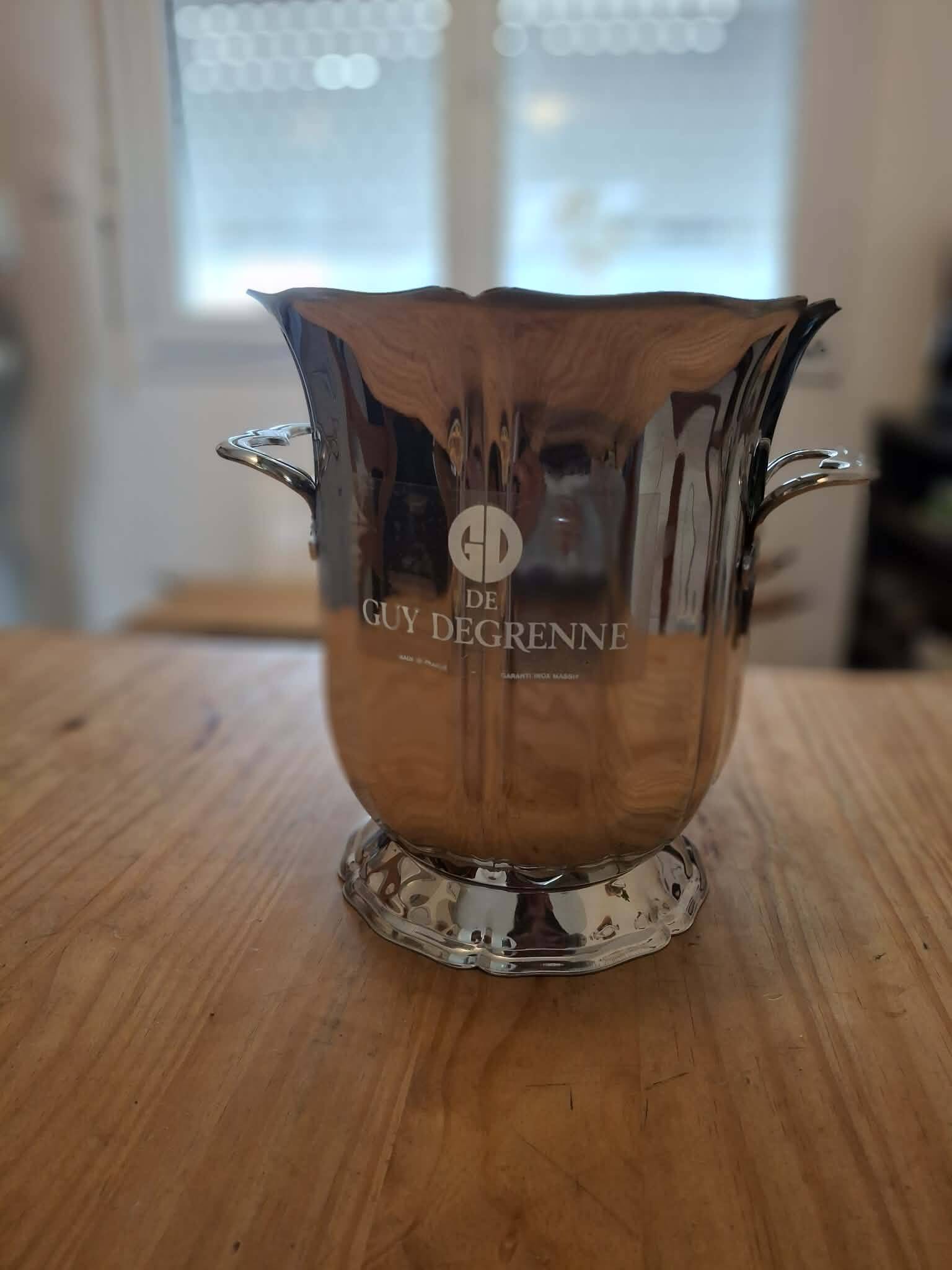 Elegant stainless steel champagne bucket signed by Guy Degrenne, made in France.