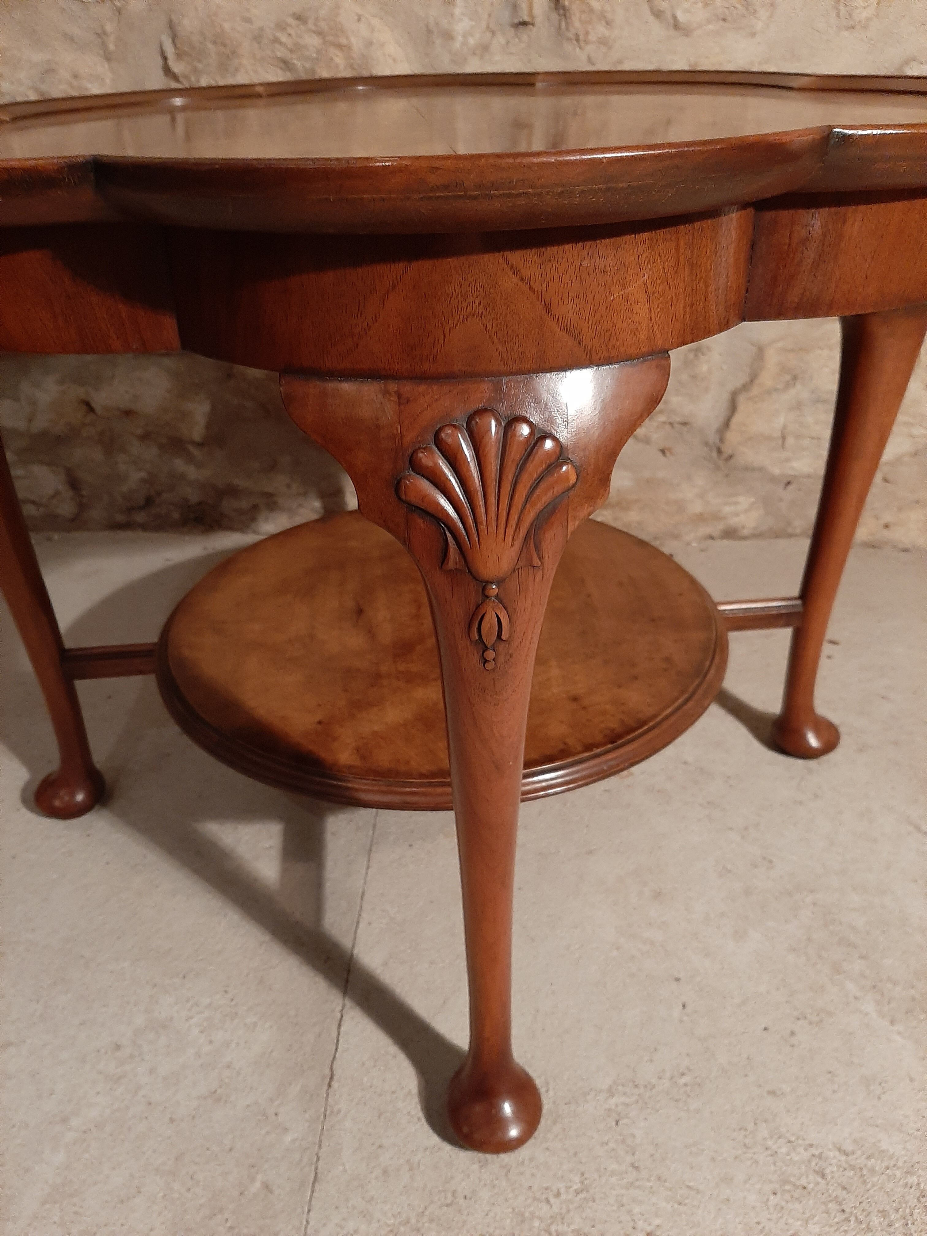 Walnut chippendale-style round coffee table