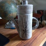 Henri Cimal's pitcher in Vallauris ceramic for the Palissy gallery.