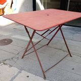 Old folding iron garden table.
