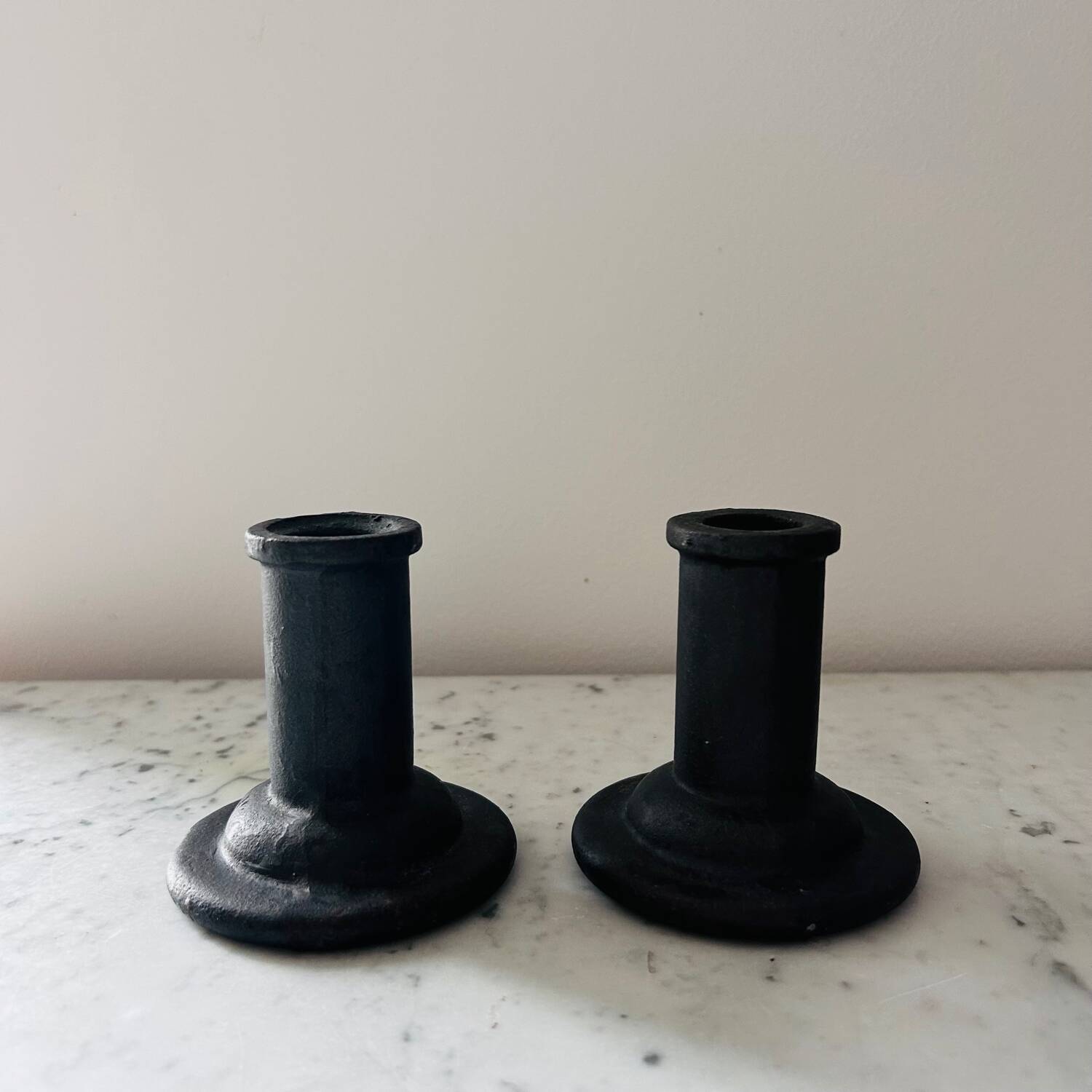 Brutalist cast iron candlestick holders
