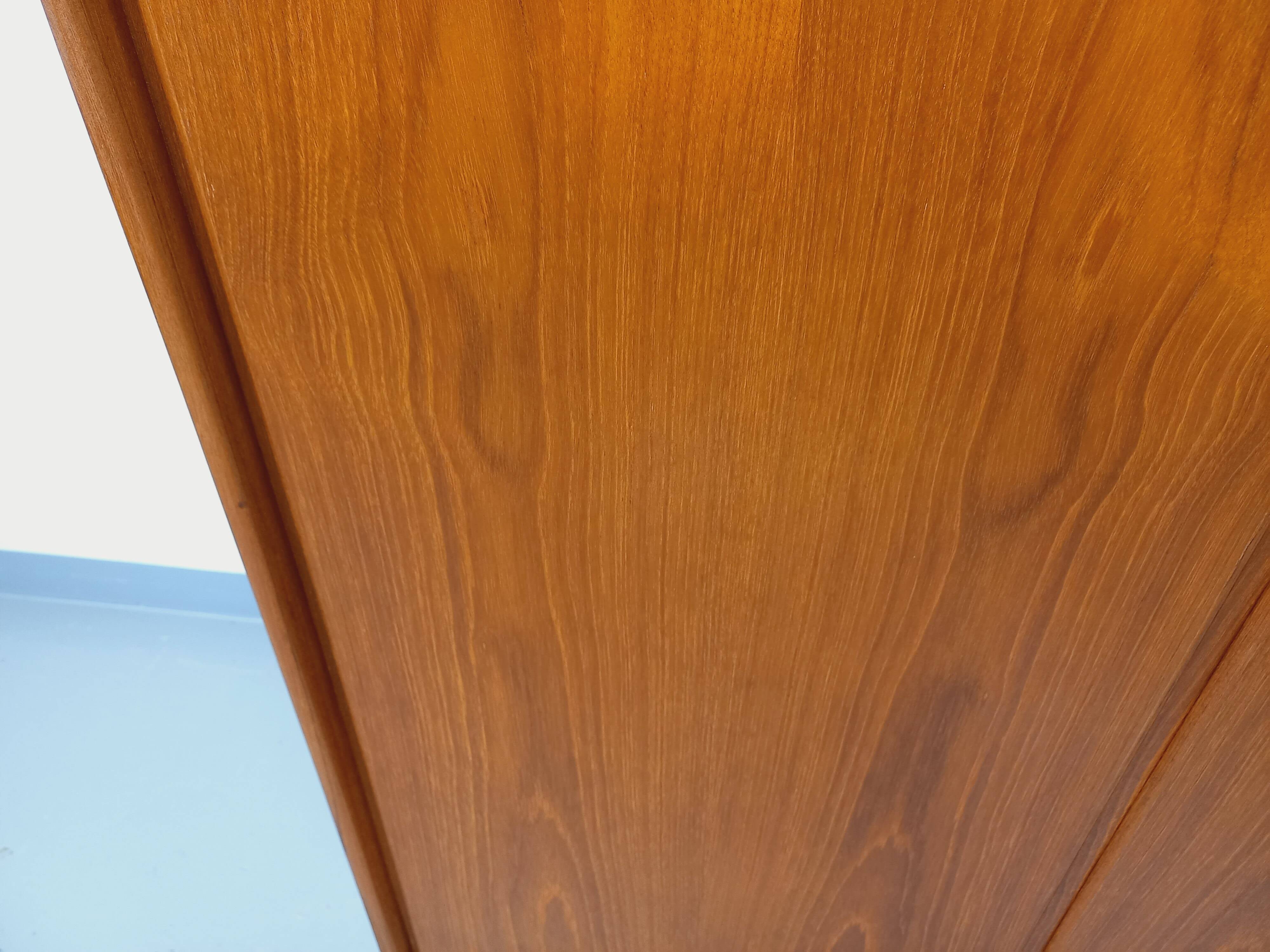 Vintage Scandinavian modernist wardrobe in teak and metal from the 1960s.