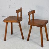Pair of tripod stools with brutalist backrests, France, circa 1960