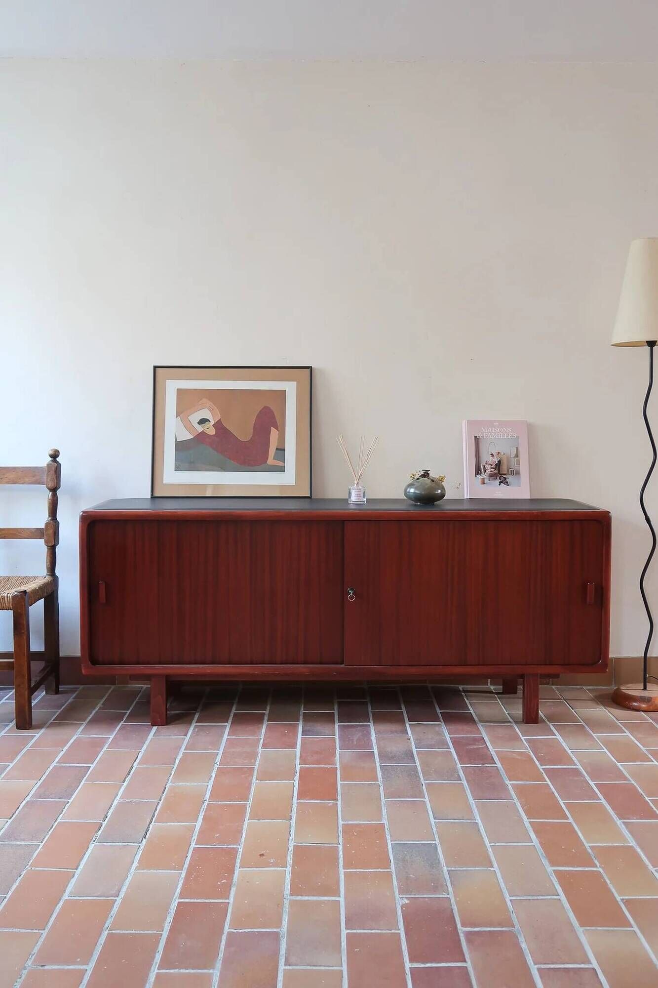 Teak enfilade, sliding doors, black faux leather top, 1970s.