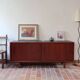 Teak enfilade, sliding doors, black faux leather top, 1970s.