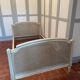 Louis XVI cane and wood bed